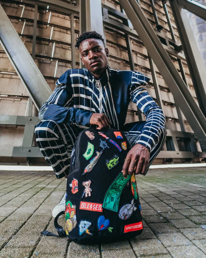 THE 32 REMOVABLE PATCHES VELCRO BACKPACK